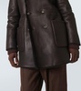 Reversible leather and shearling peacoat