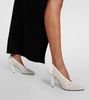 Perforated Cone leather pumps 