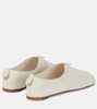 Floaty leather slip-on shoes