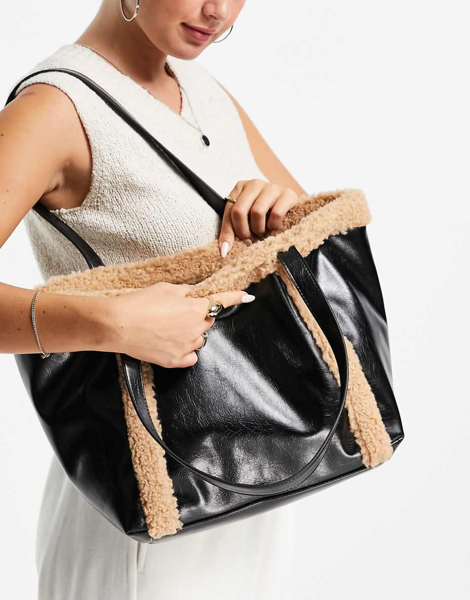 ASOS DESIGN tote bag with faux shearling trim in black