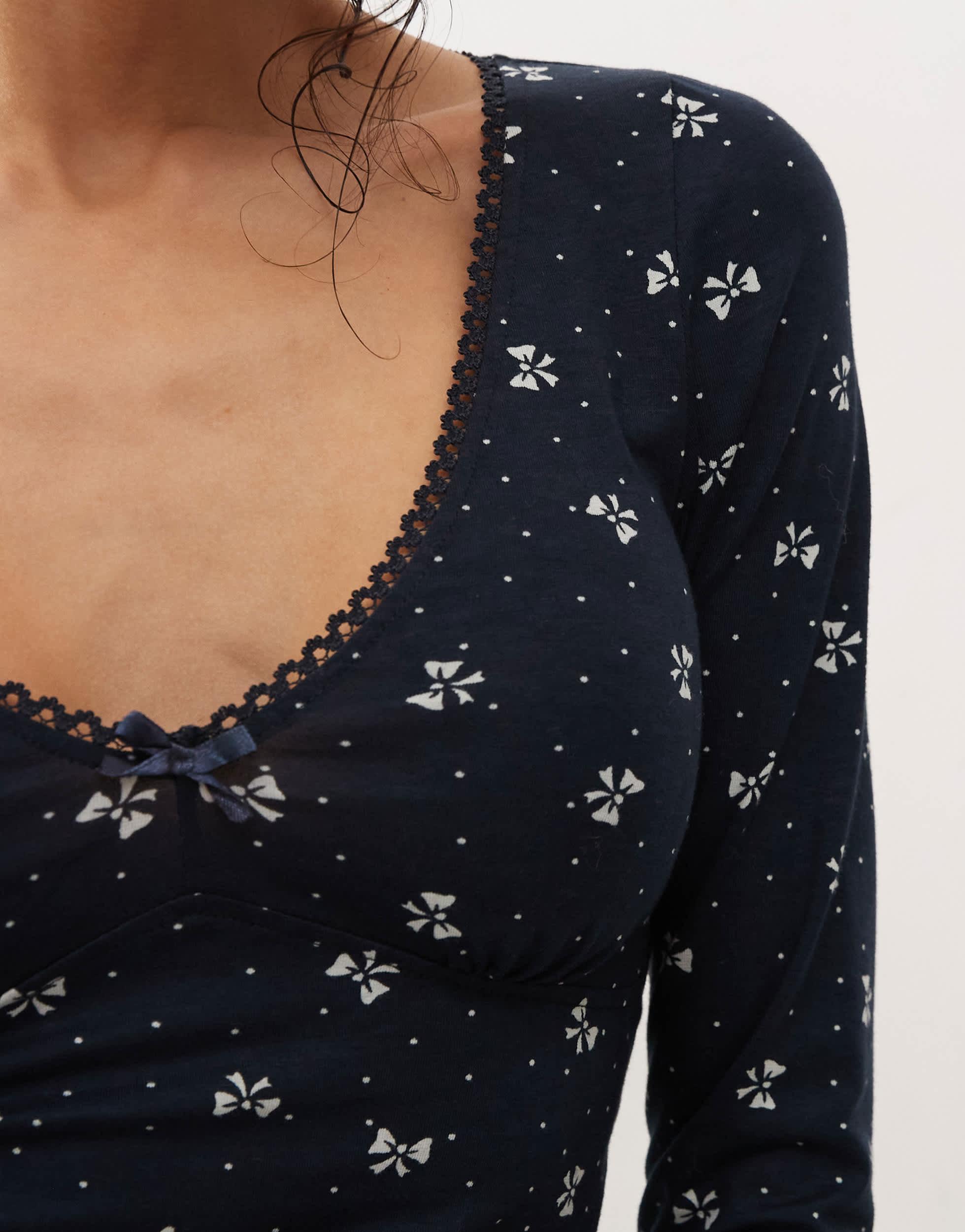 Motel salisa mini bow print long sleeve top in navy