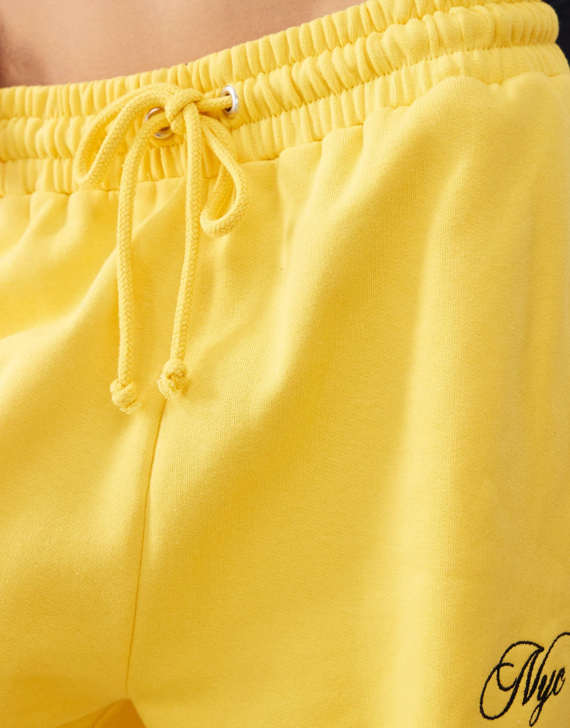 COLLUSION oversized straight leg sweatpants in yellow with embroidery