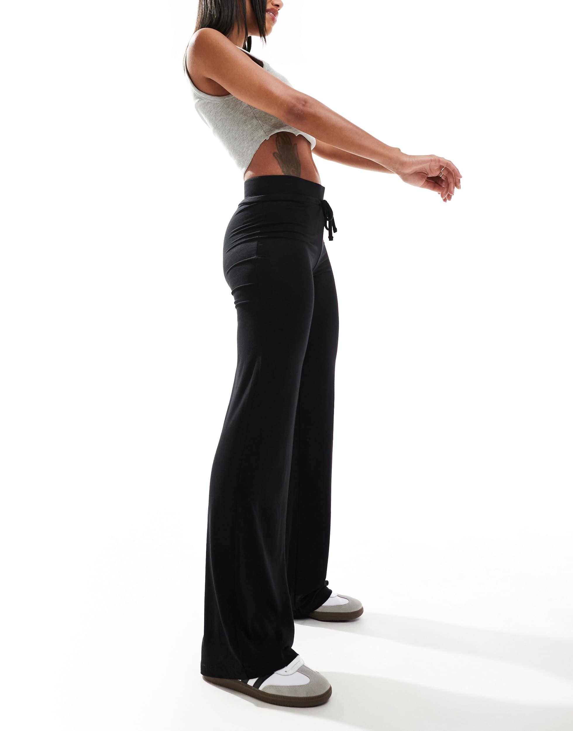 COLLUSION yoga pants in black