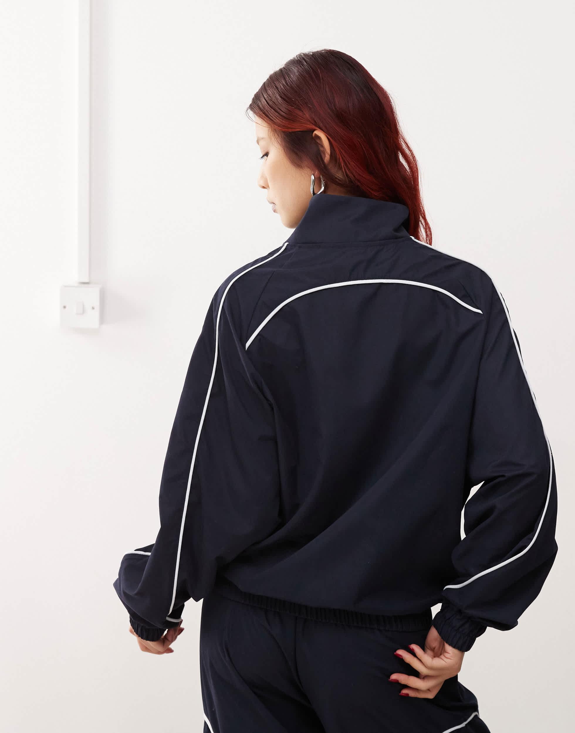 COLLUSION Unisex nylon jacket with contrast seam and print in navy - part of a set