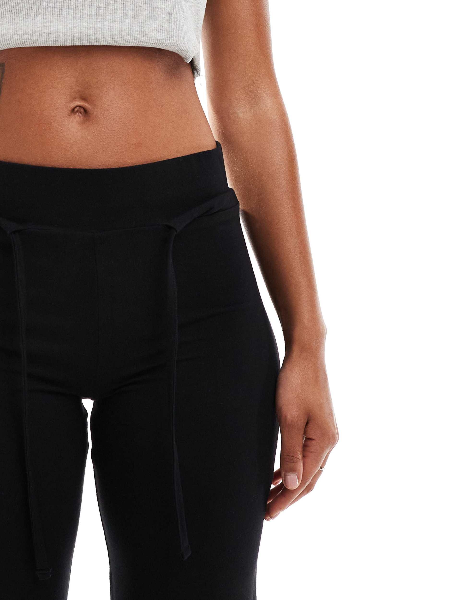 COLLUSION yoga pants in black