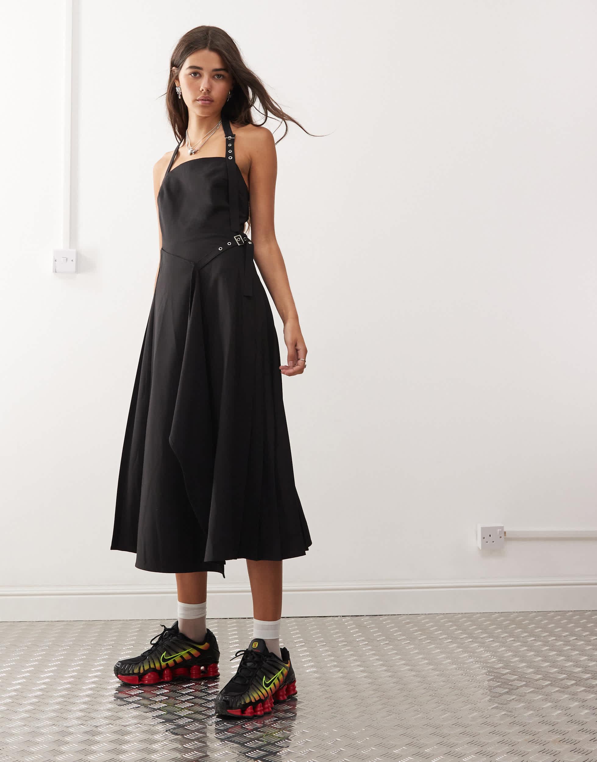 COLLUSION midi pinny dress with pleated hem and hardware detail in black