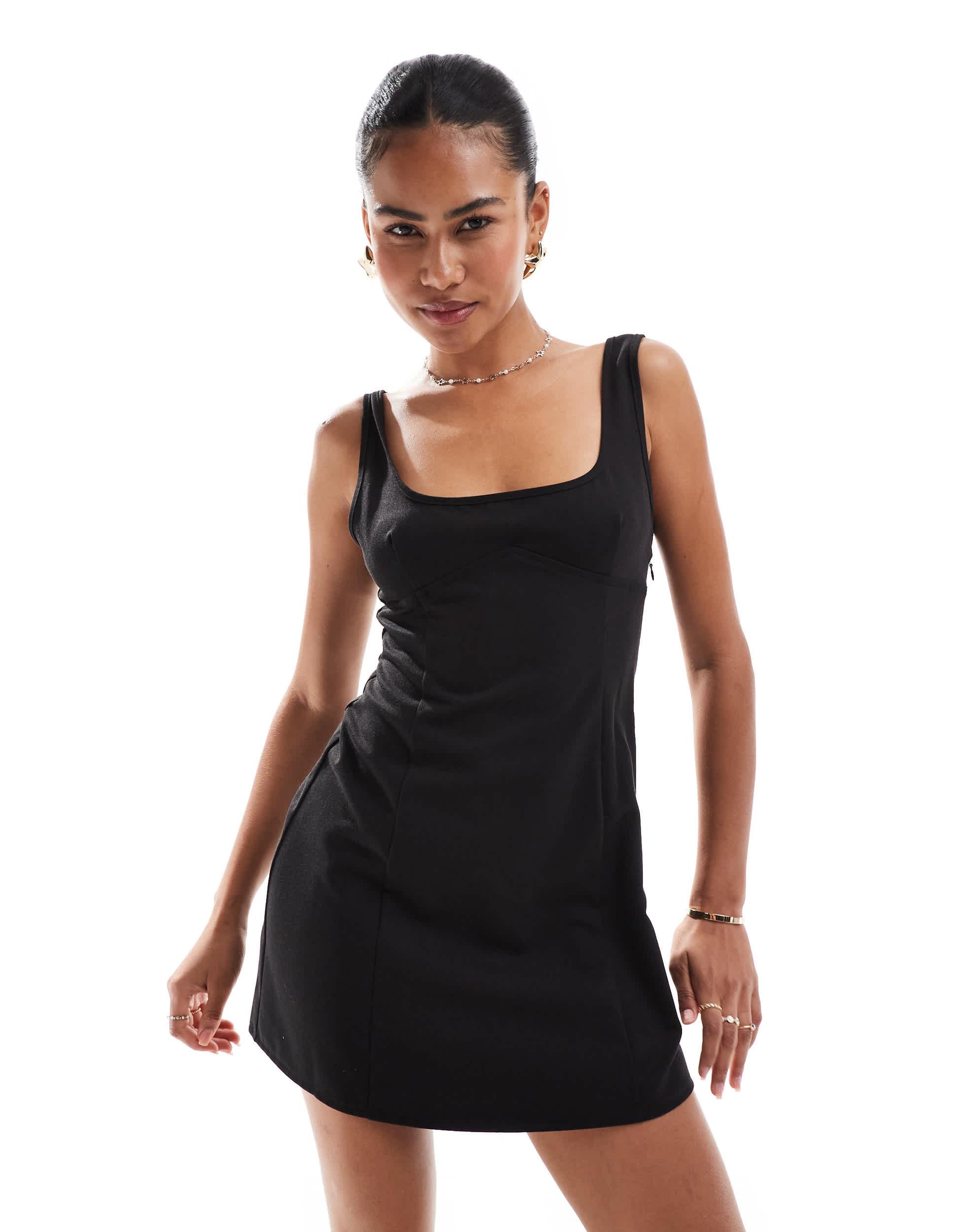 Motel Irinel bow back detail mini dress in black