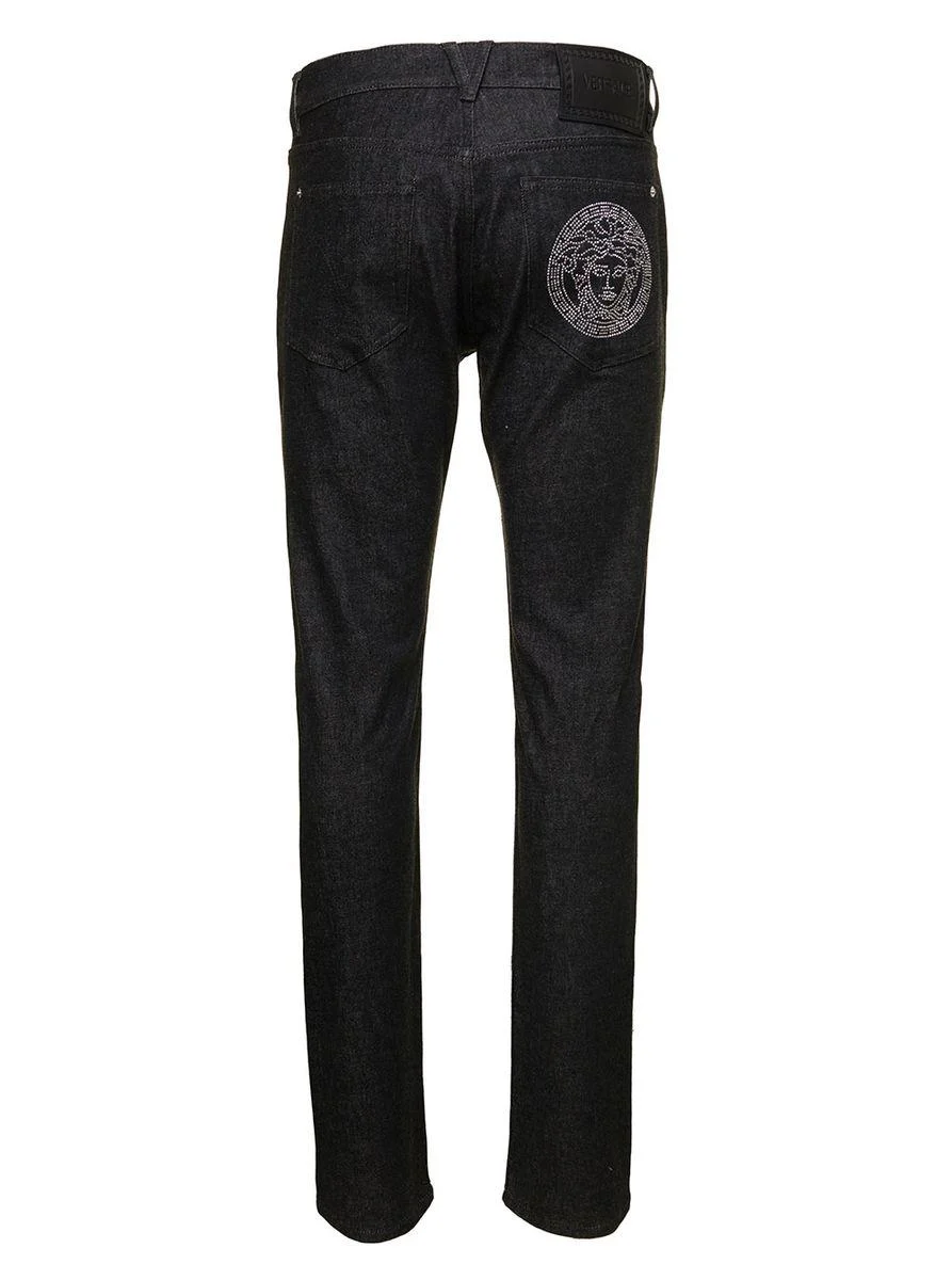 Black Straight Jeans With Studded Medusa In Stretch Cotton Denim Man