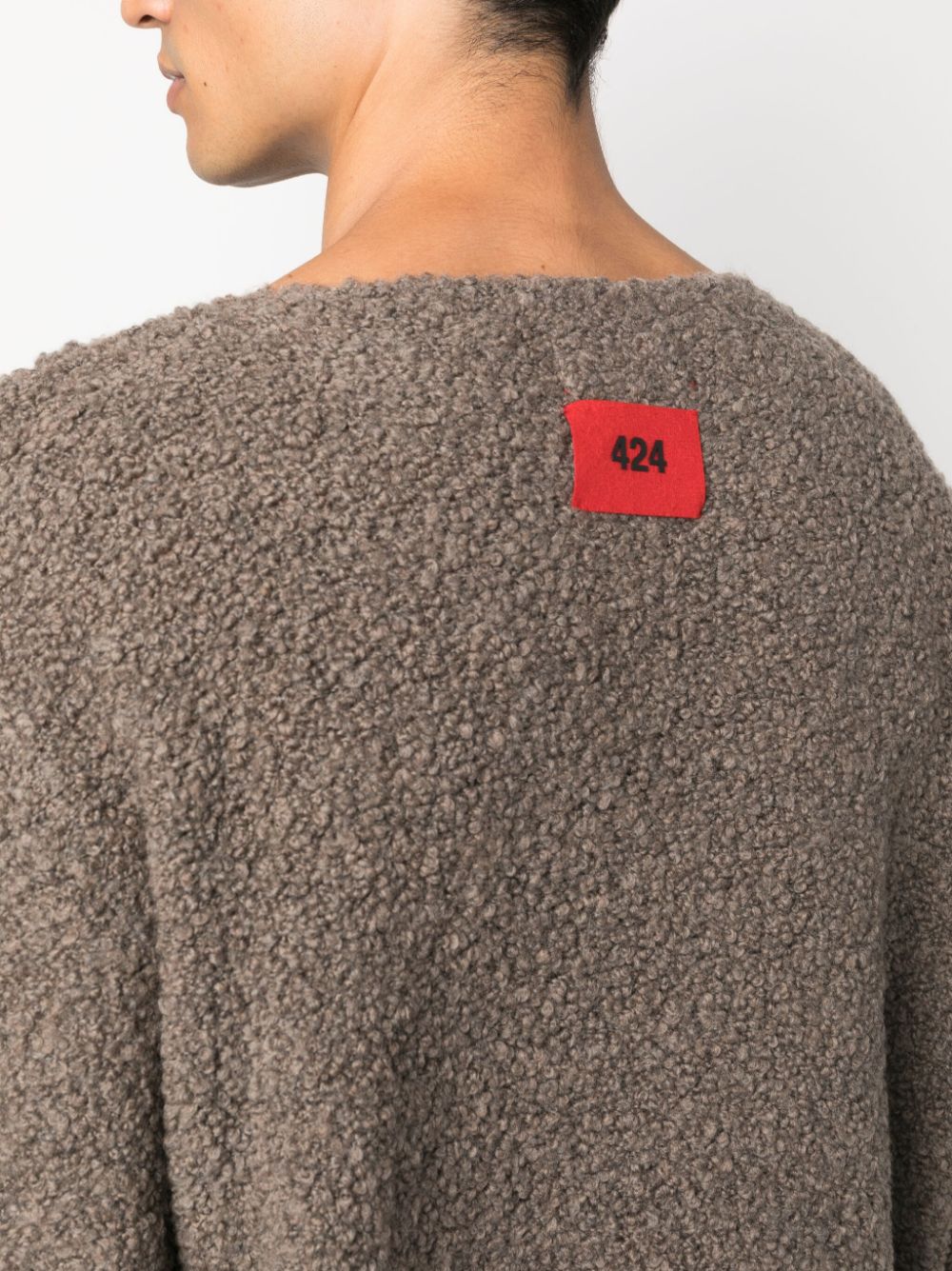 cutout-detail fleece-texture jumper