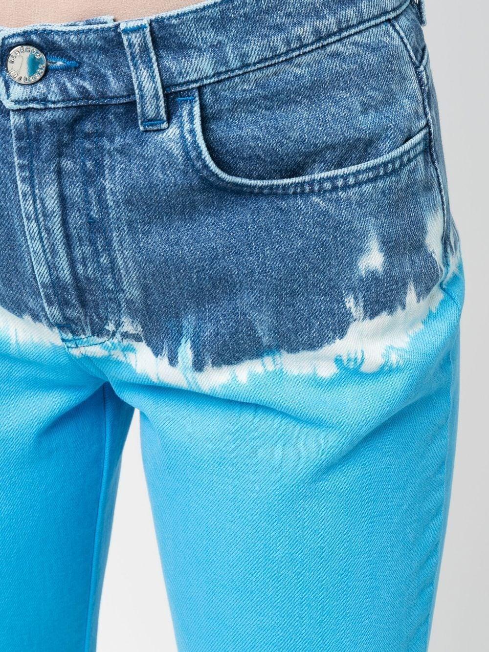 tie-dye flared jeans