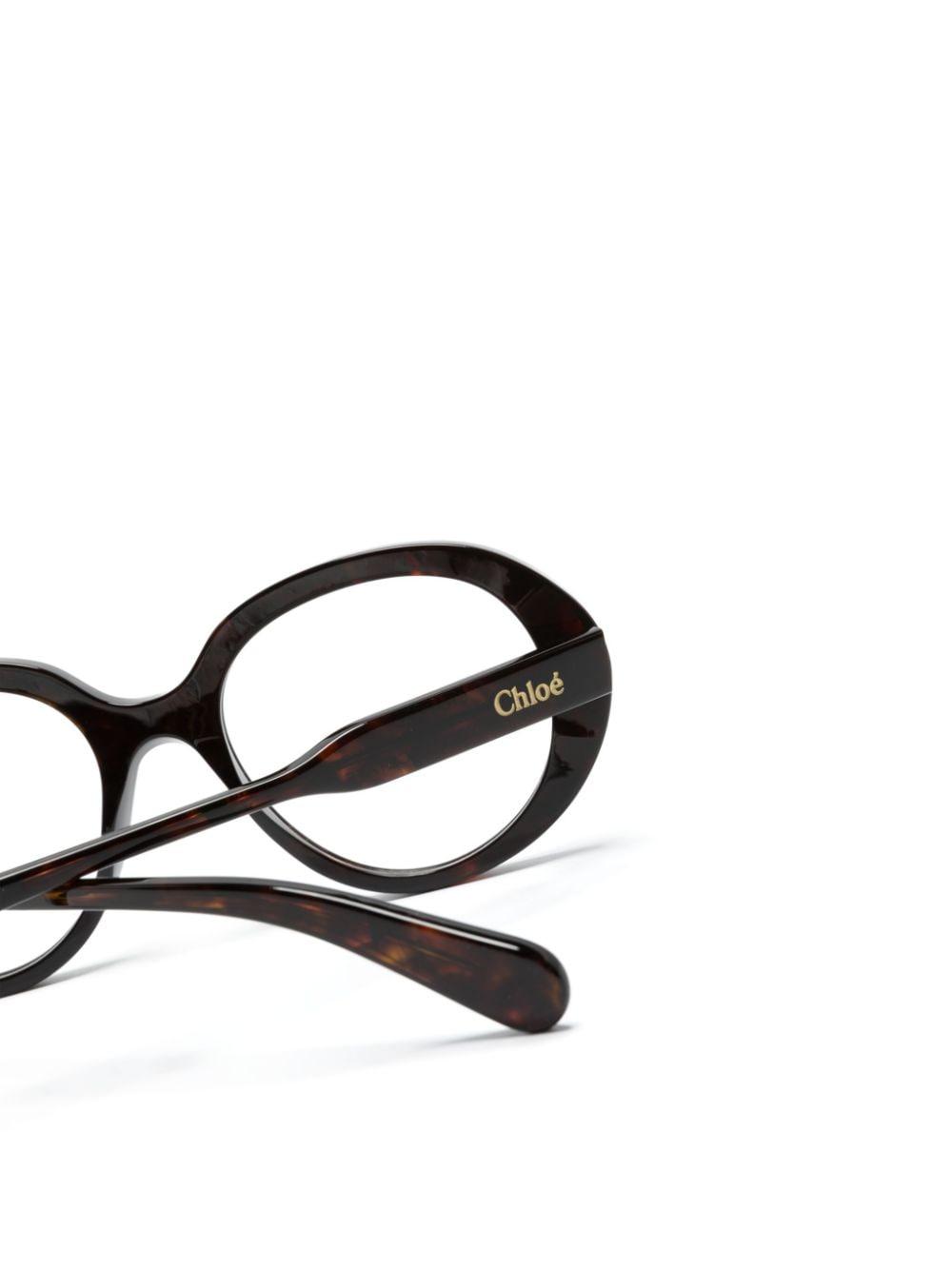 tortoiseshell round-frame glasses