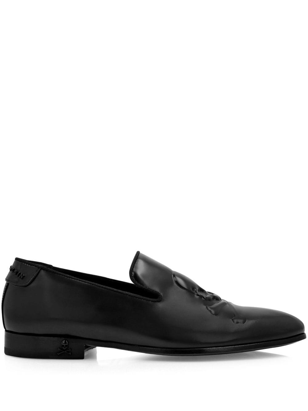 skull-embossed leather loafers