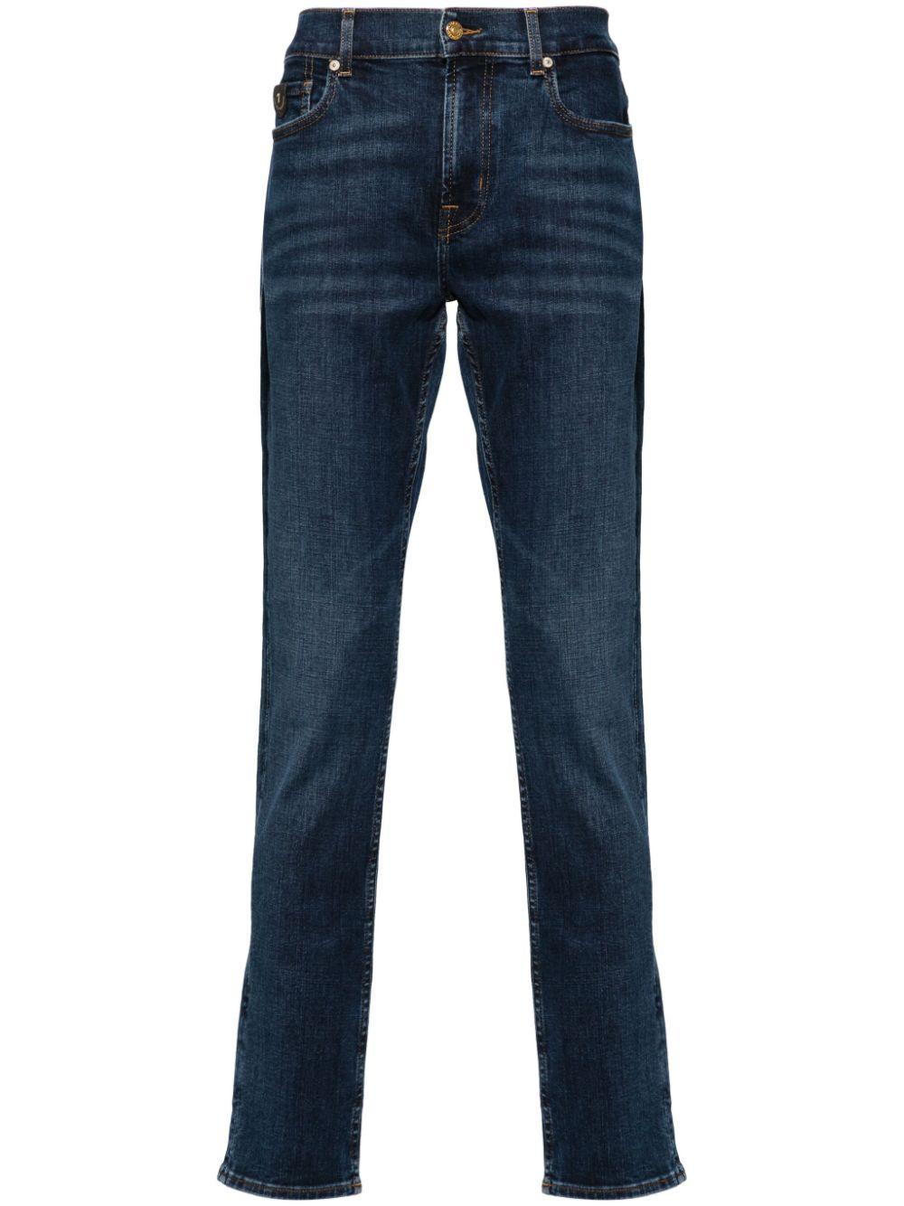 Paxtyn mid-rise skinny jeans