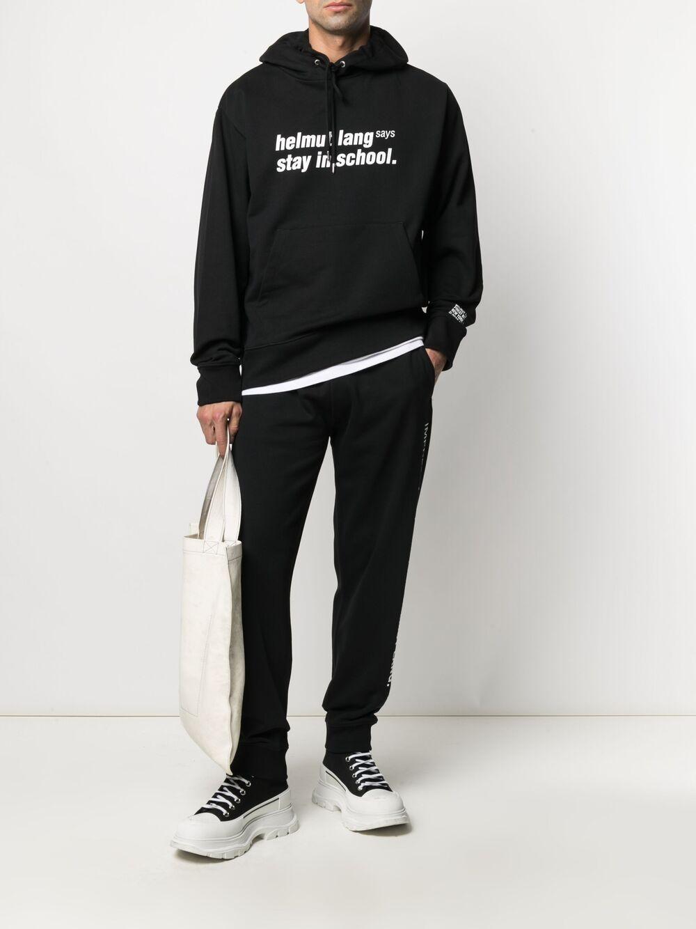 Impress slogan-print track pants