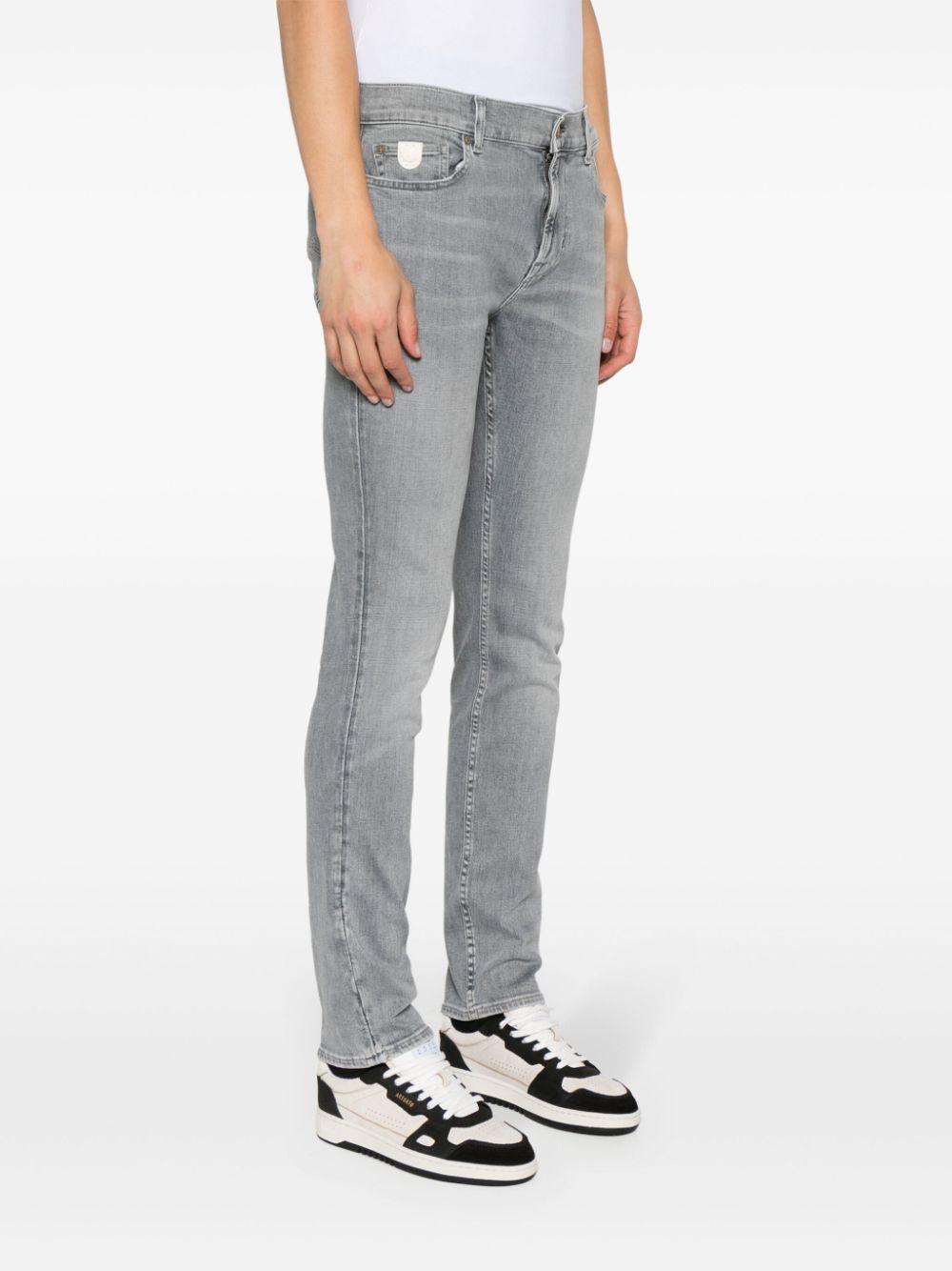 skinny-leg cotton-lend jeans