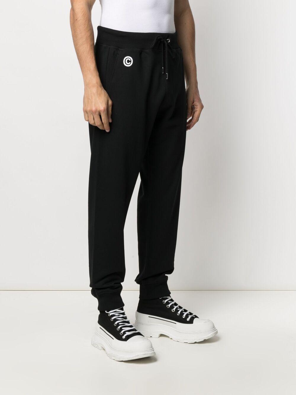 Impress slogan-print track pants