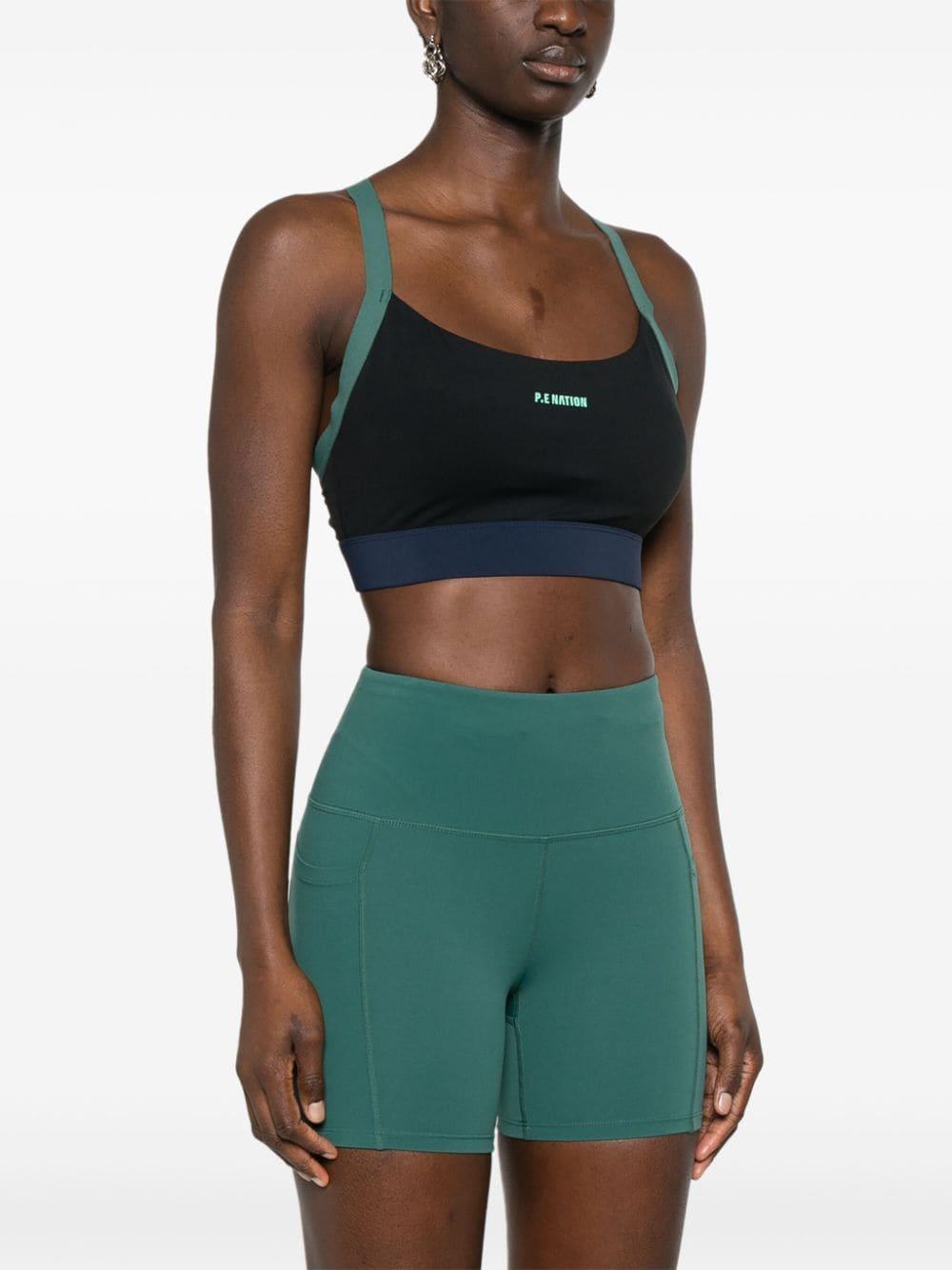 Takeover racerback sports bra