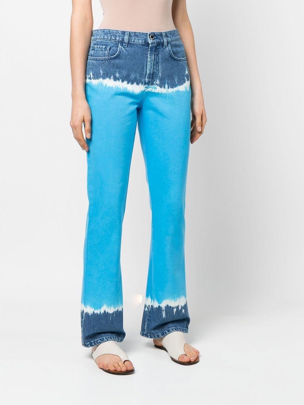 tie-dye flared jeans