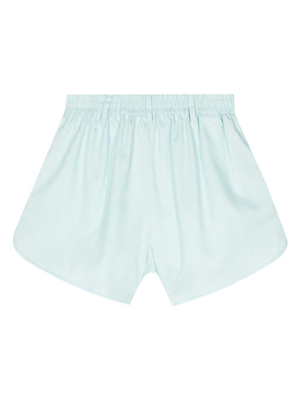 Eyelike-motif metallic shorts