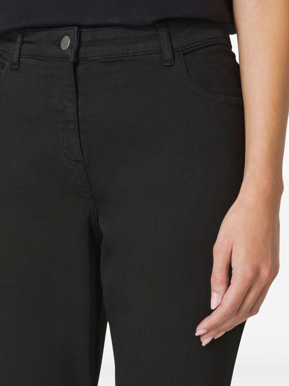 button-fastening tapered trousers 