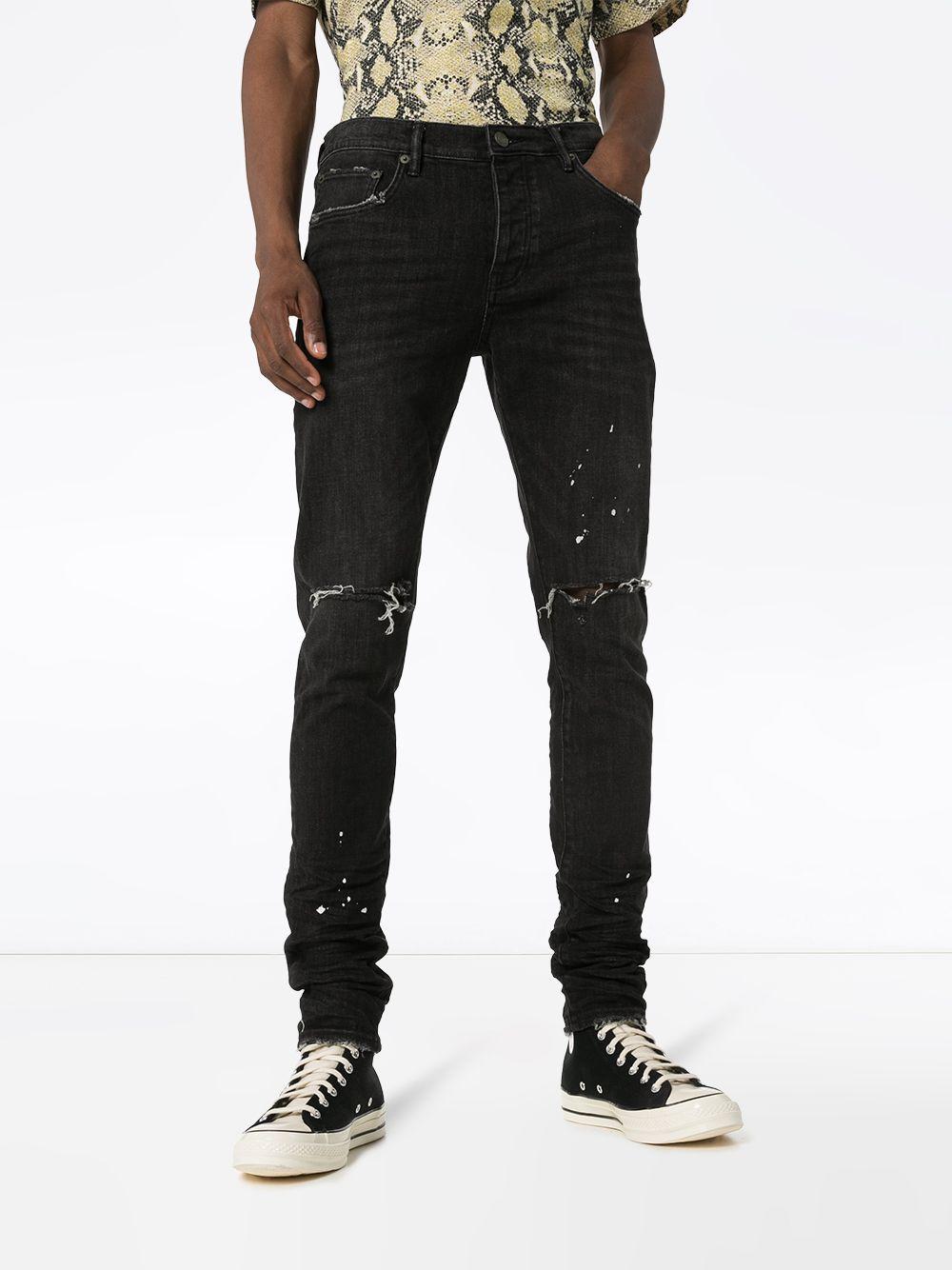 Distressed ripped knee jeans