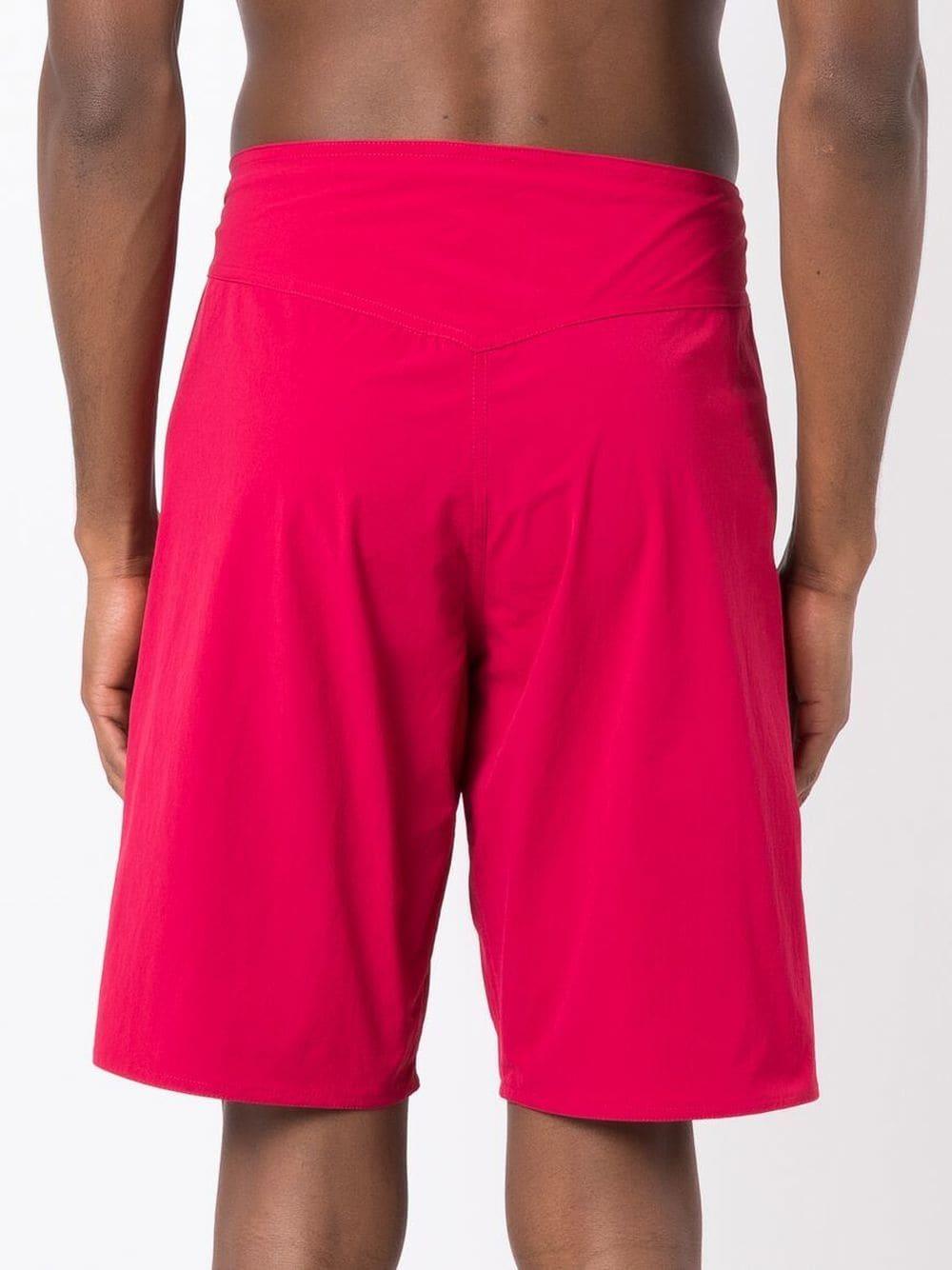 knee-length swim shorts