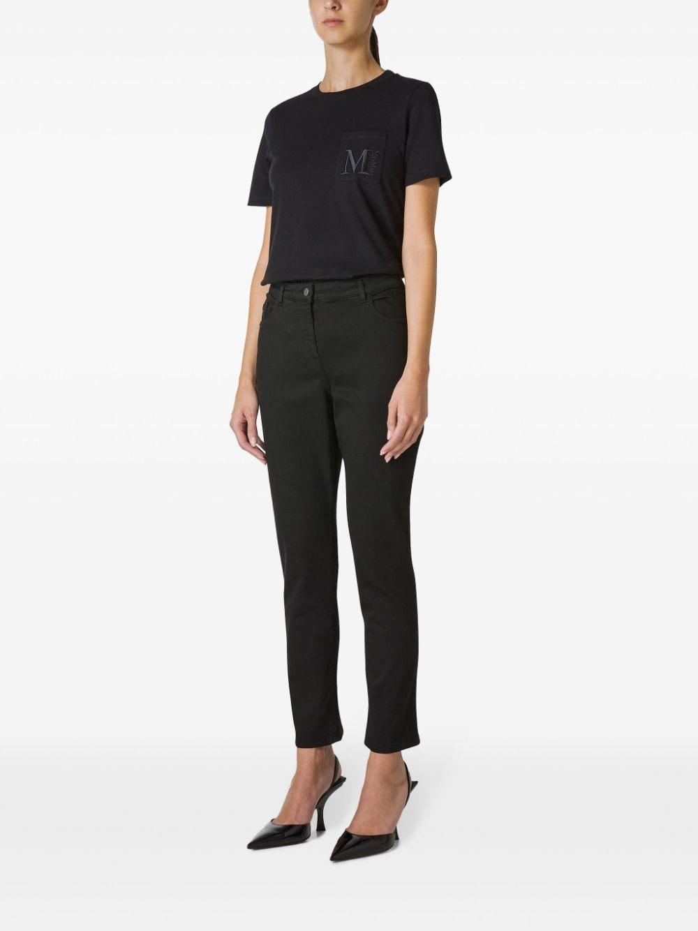 button-fastening tapered trousers 