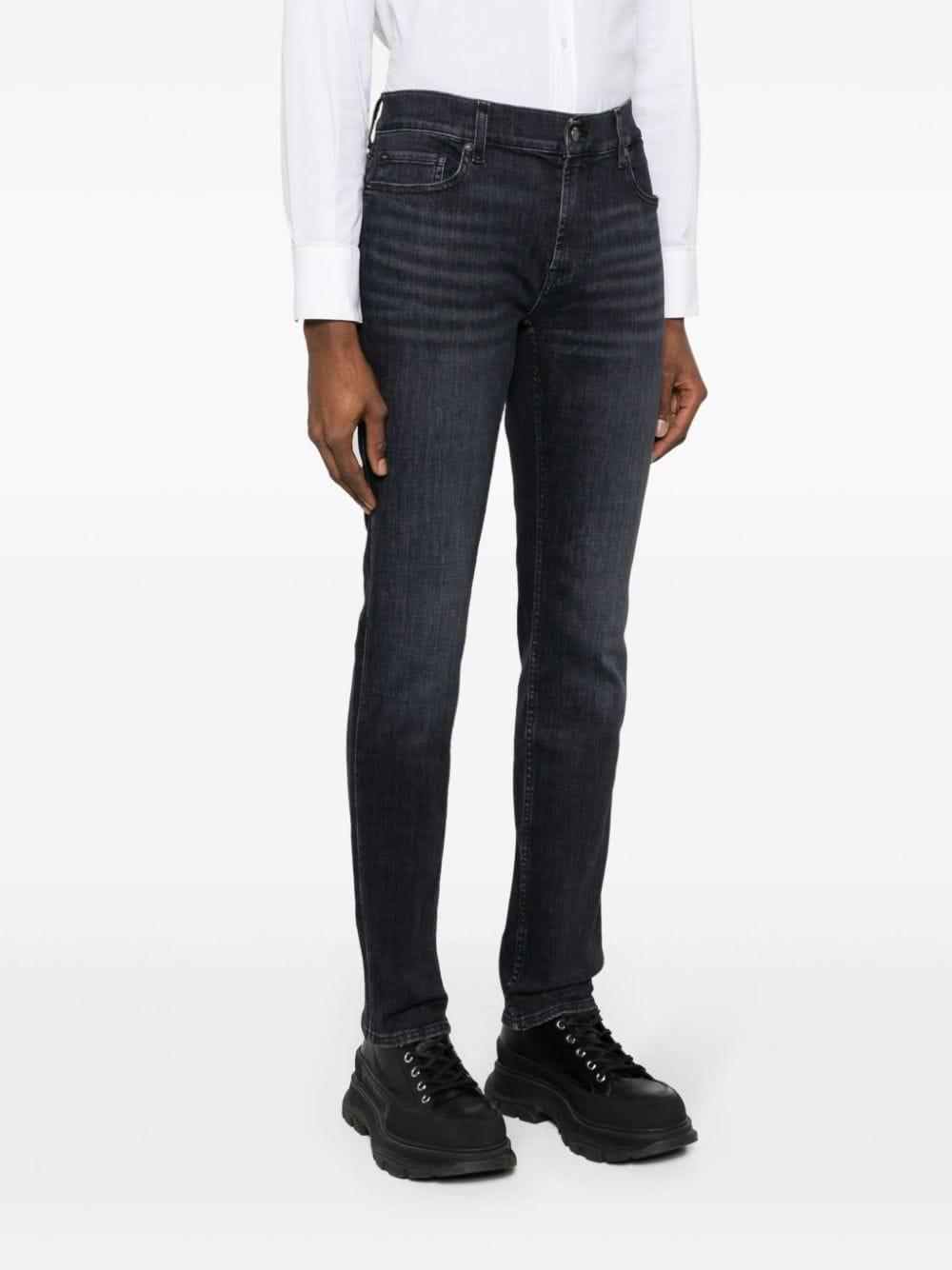 Paxtyn mid-rise skinny jeans