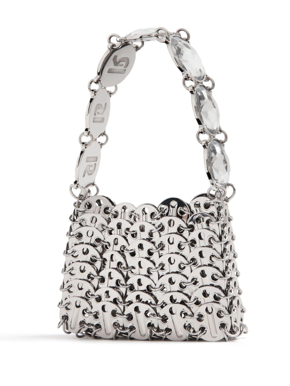 Disc embellished shoulder bag