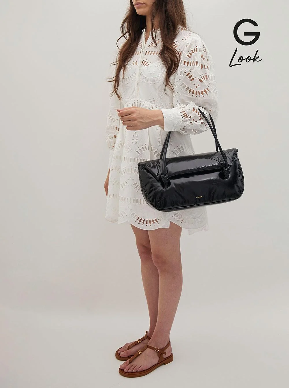 Black Handbag with Embossed Logo in Leather Woman