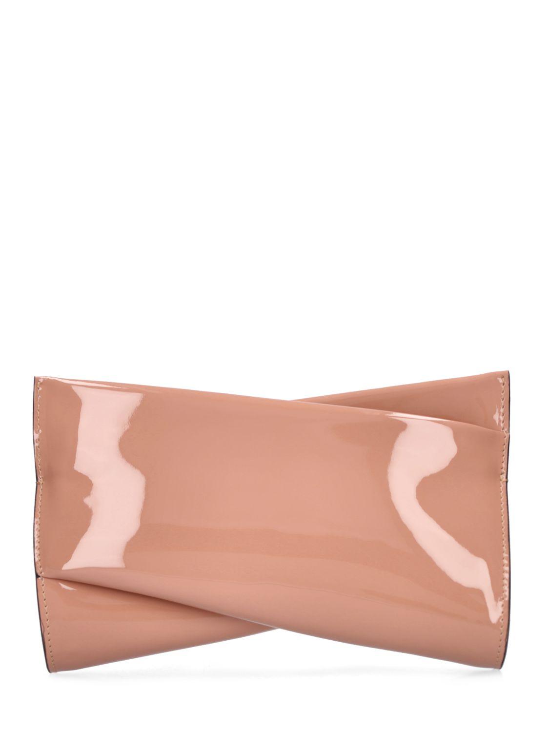 Small Loubitwist patent clutch