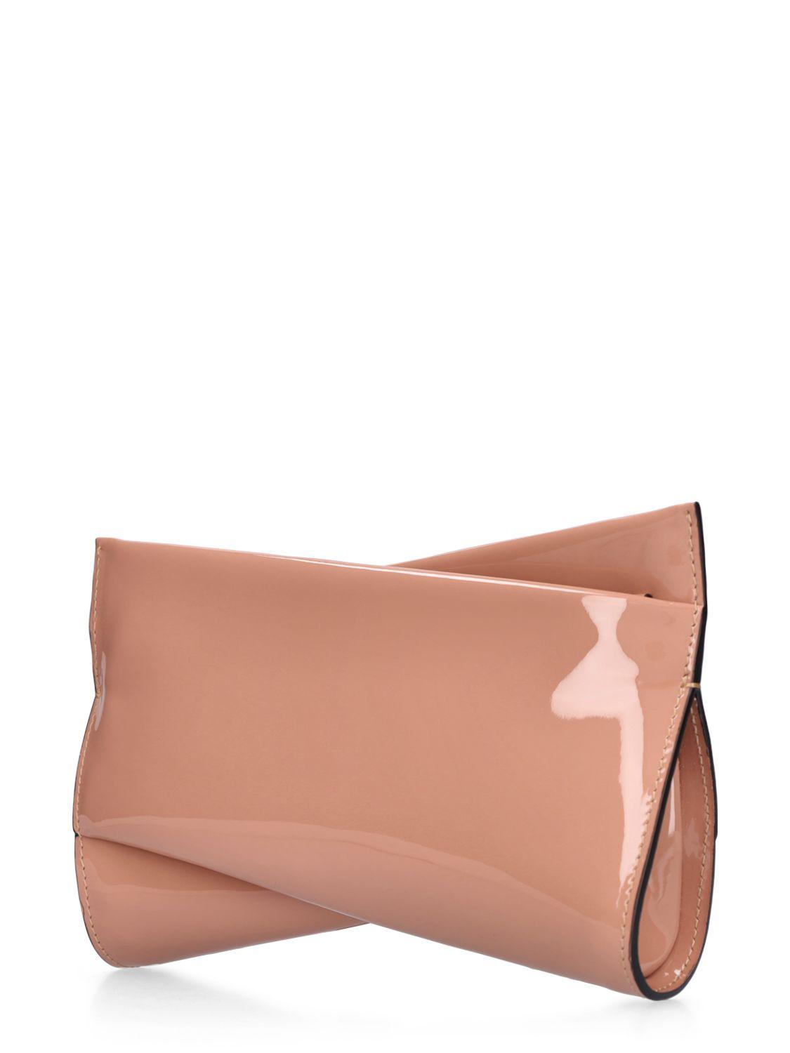 Small Loubitwist patent clutch