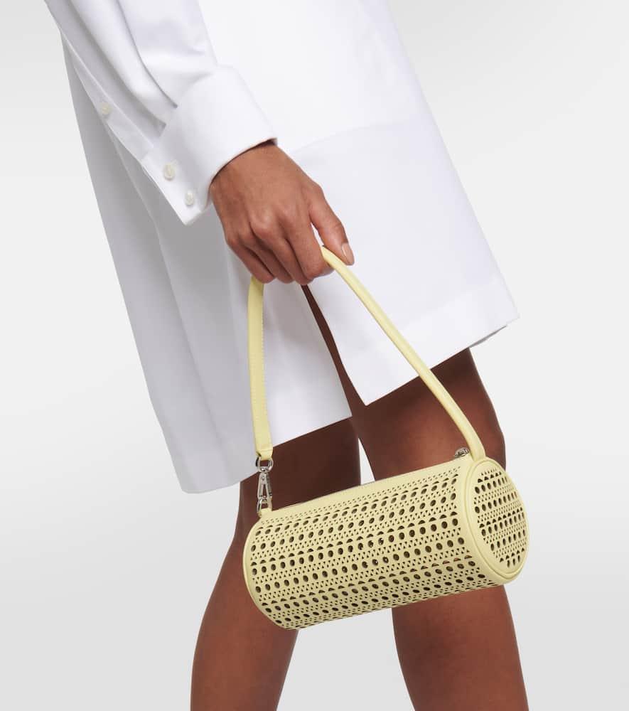 Tube perforated leather shoulder bag