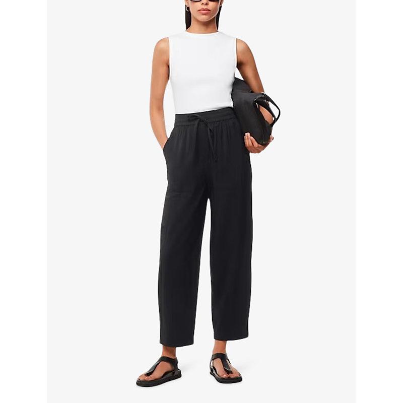 Drawstring-waist carrot-leg high-rise woven trousers