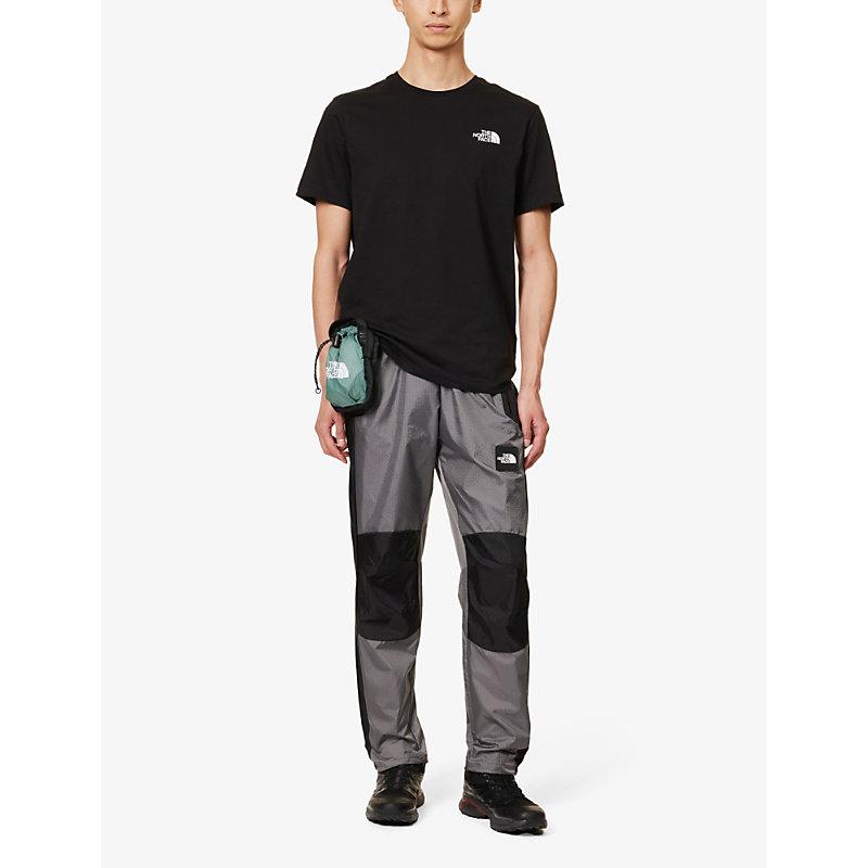 Wind brand-patch straight-leg mid-rise shell trousers