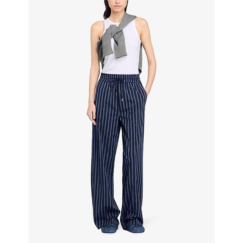 Stripe-print relaxed-fit straight-leg cotton trousers