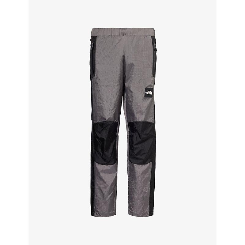 Wind brand-patch straight-leg mid-rise shell trousers