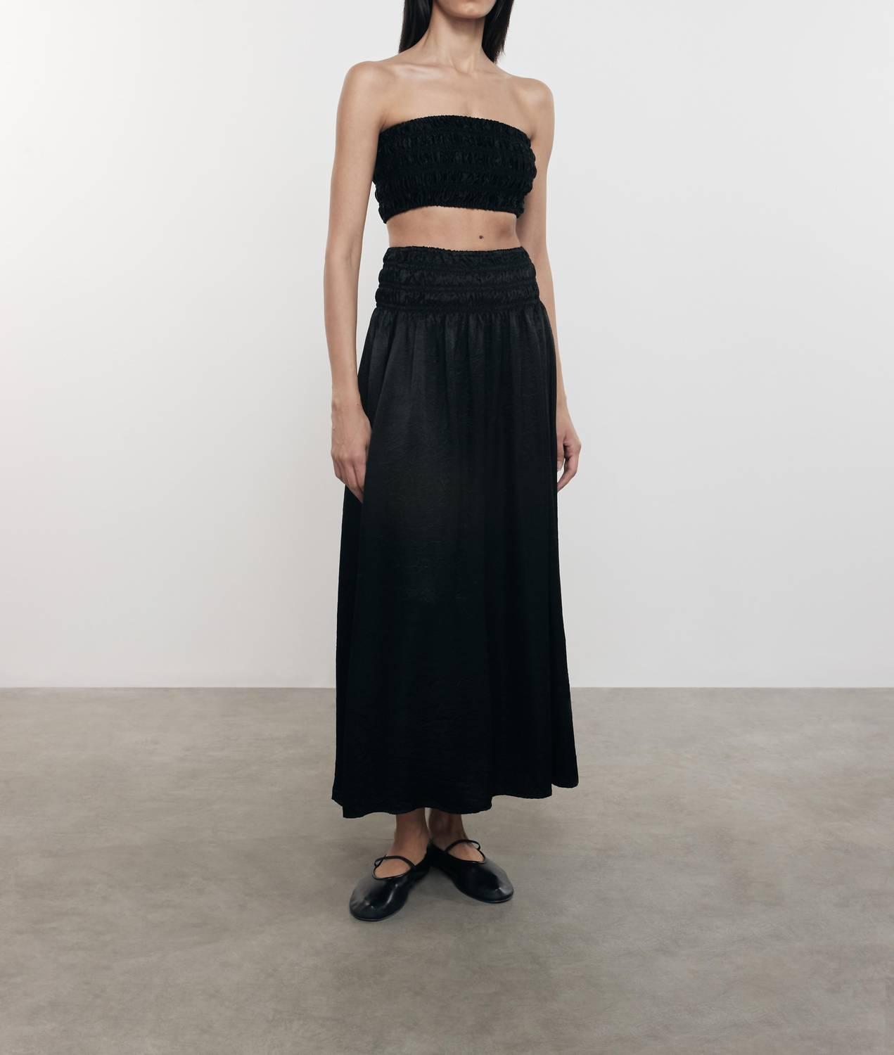 textured satin smocked skirt in black