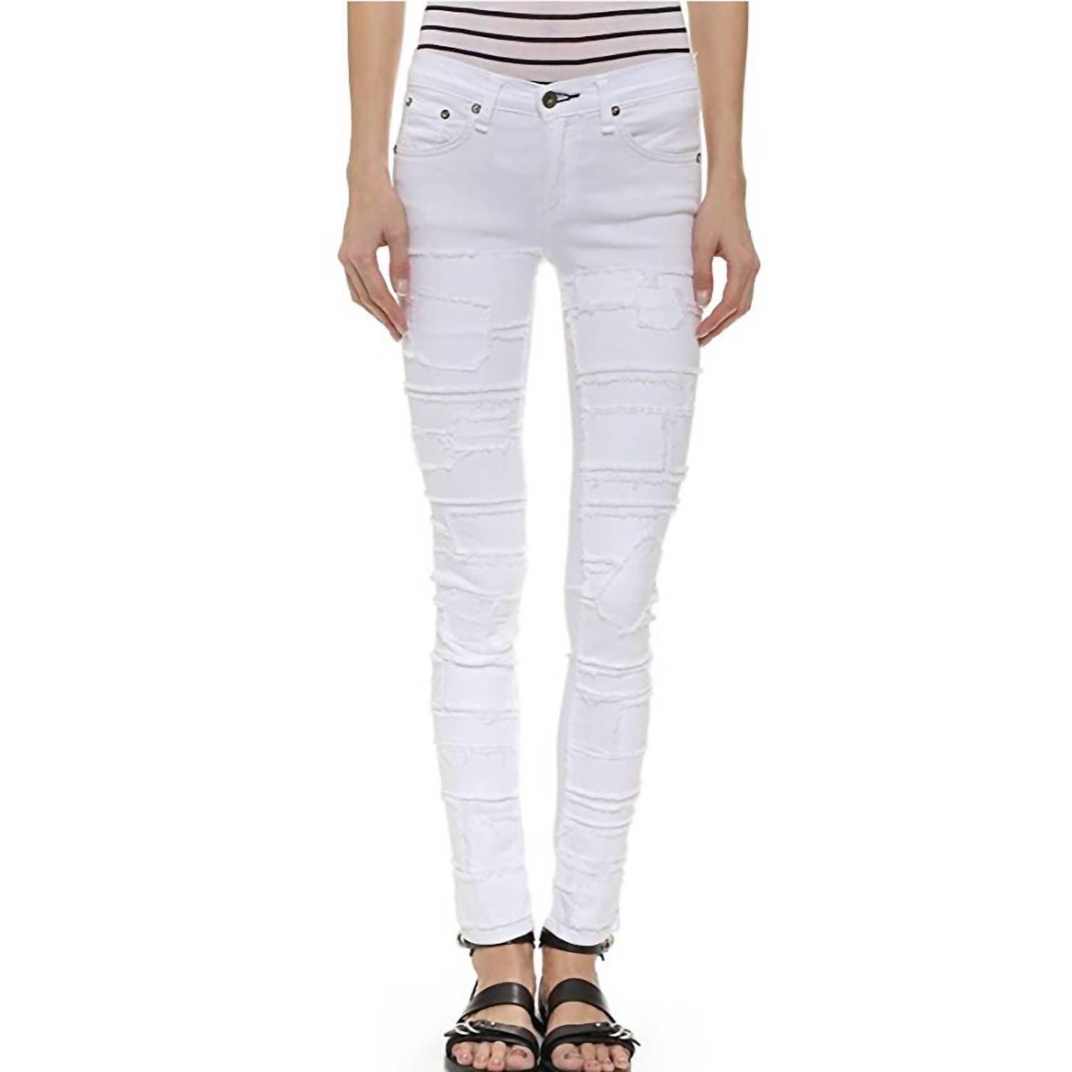 torn skinny jean in white